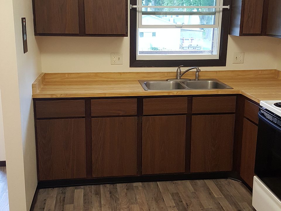 Dishwasher has recently been added to the left of the sink