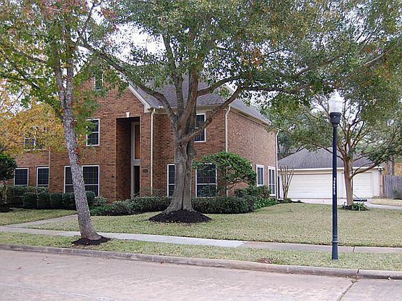 Another view of the corner lot and three car garage