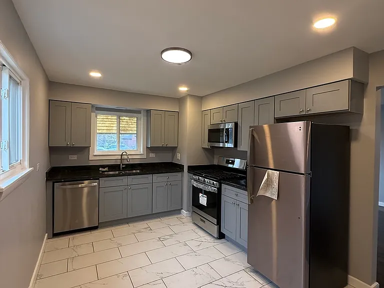 7732 Lotus Ave — Photo 2