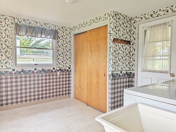 Back Entrance leads into this Mudroom/Laundry Room