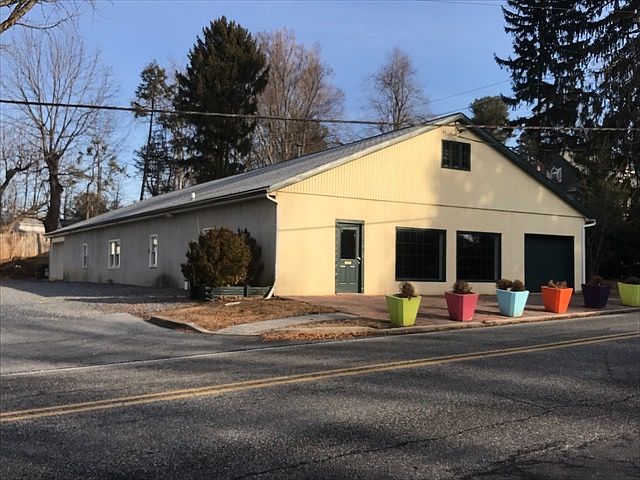 Front of Building with Parking Area