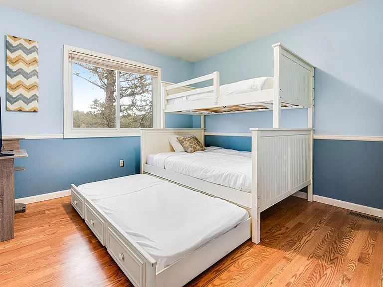 Third bedroom with large bunkbed and trundle