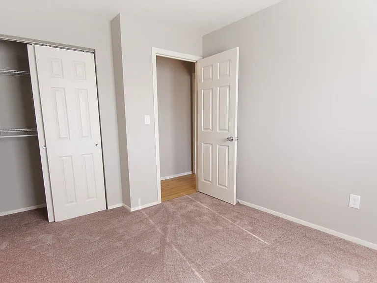 carpeted bedroom