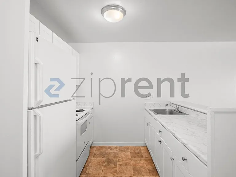 100 Village Dr #202 — Photo 11