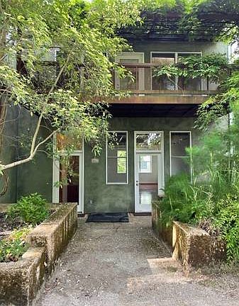 Entrance on right to downstairs Live/Work with an inner door to upstairs and left entrance door to upstairs