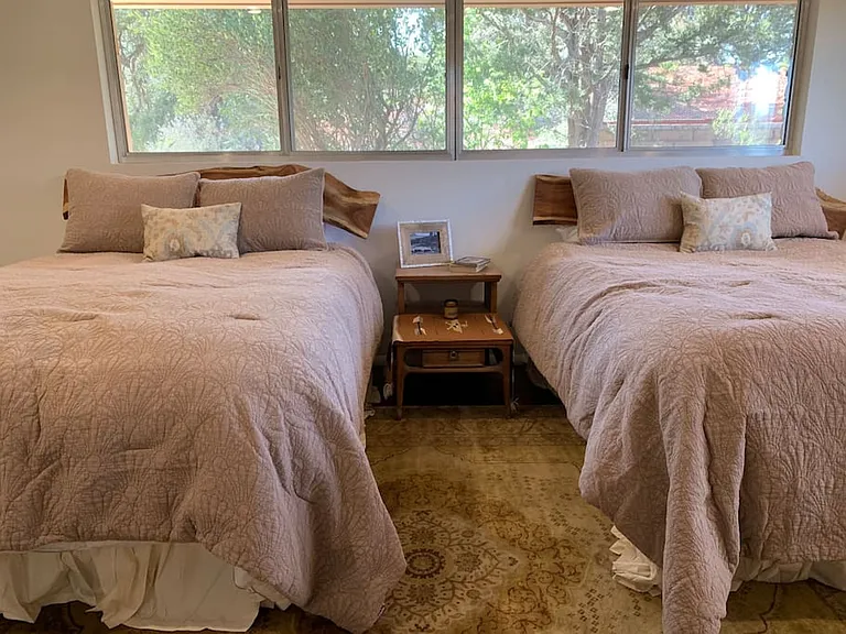 Upstairs Dual Queen Room with queen beds and ensuite bathroom