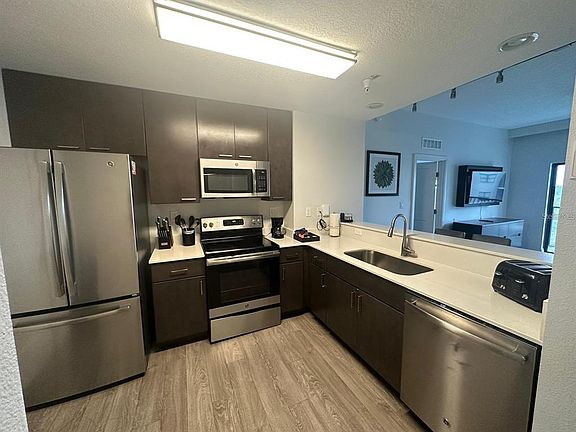 3rd image of 14501 GROVE RESORT AVENUE #3406