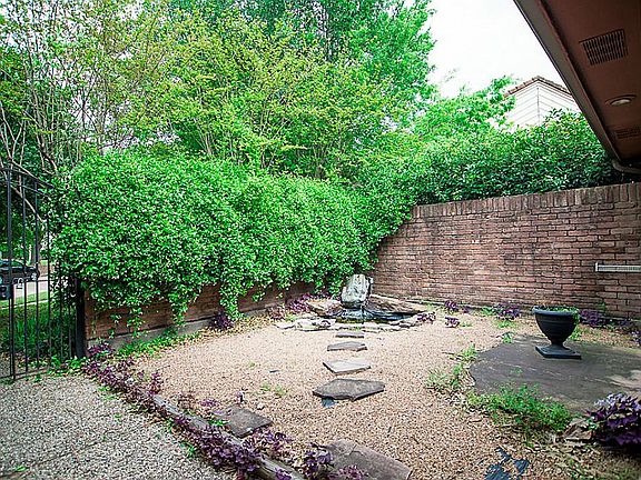 Enclosed private patio area when you first enter the home.
