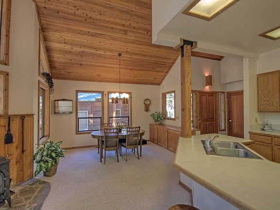 "Spacious dining with built-in cabinetry"