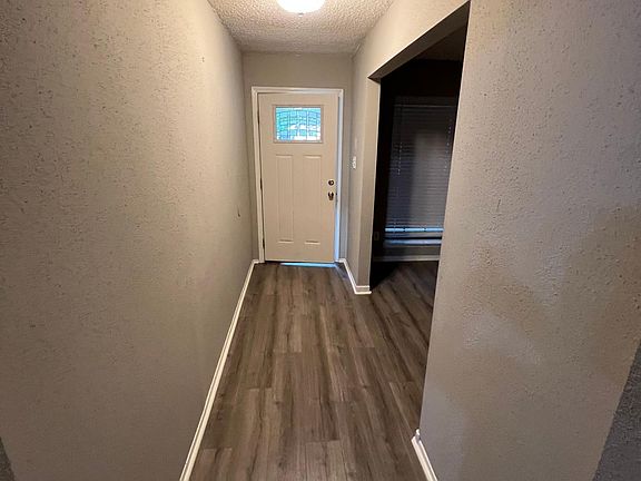 Entry hall way with bonus room to the right.
