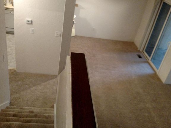 Dining room leading to private fenced patio