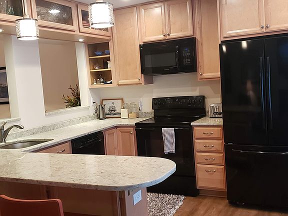 Updated kitchen with breakfast bar.