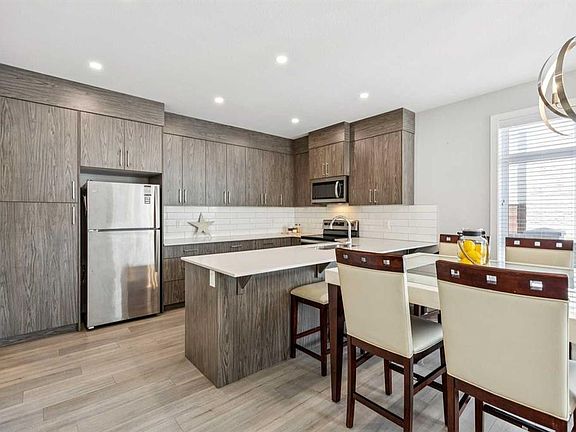 5th image of 310 E Sage Meadows Gdns NW