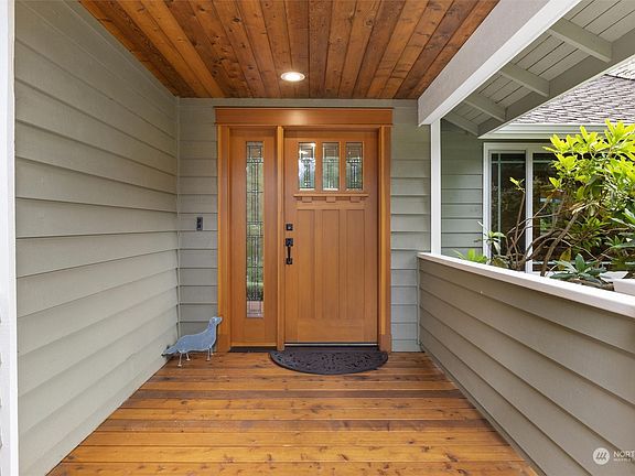 Enter the house through this covered front porch.>