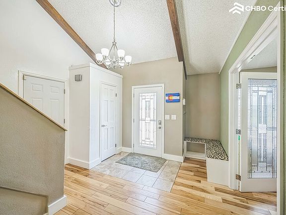 Front entrance, coat closet and shoe area