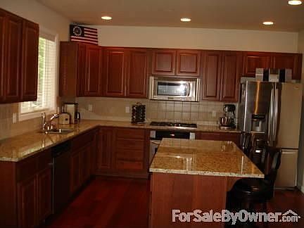 Gourmet kitchen
						:
						Beautiful granite counter tops, stainless steel appliances and cherry cabinets!