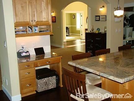 Spaciouse Kitchen
						:
						Stainless steel Kitchen Aid gas range and electric convection oven.