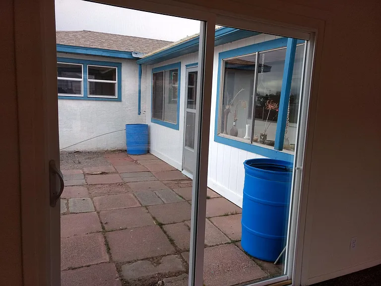 Back Patio lending into Sunroom.