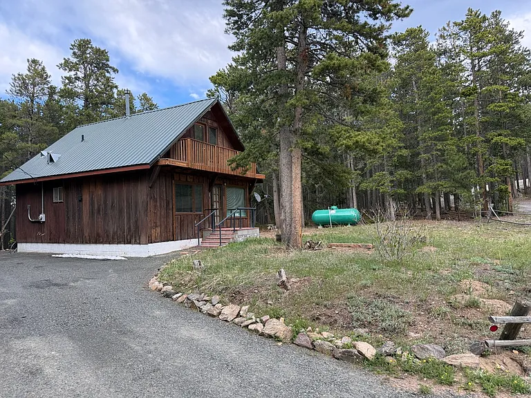 House & 500 gal propane tank