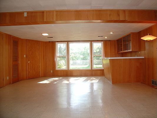 Huge family room. Leads to walk out to back yard