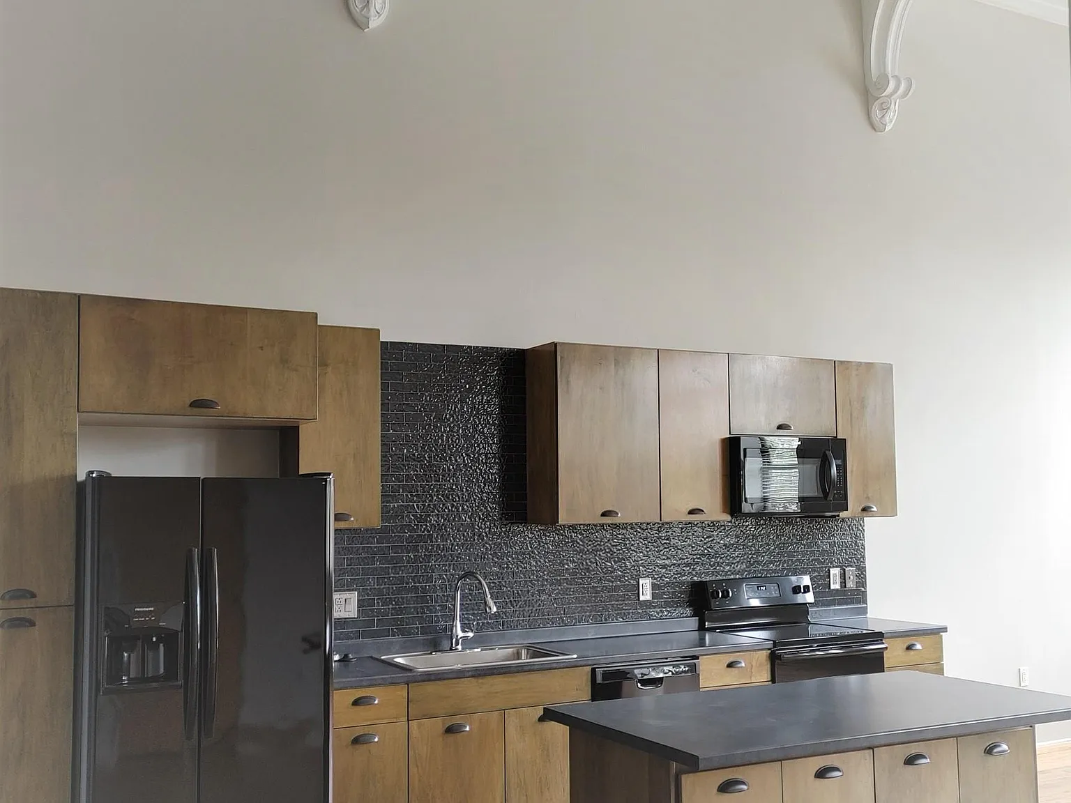 Helix Realty- The Original SOHO LOFTS — Photo 3
