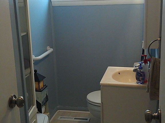 Update bathroom offers three mirror medicine cabinet, shower/bath and closet