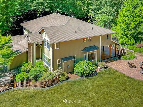 4 bedrooms, 2.75 bathrooms, office and bonus room on a 1.18 acre lot backing to greenbelt.