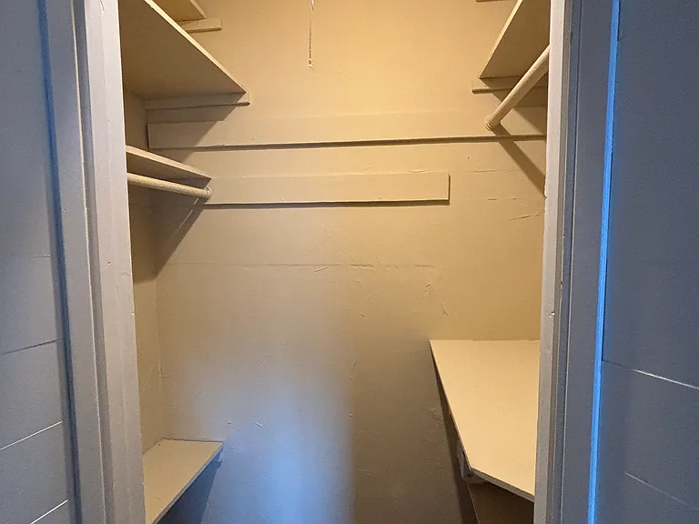 Spacious walk in closet in the main bedroom.