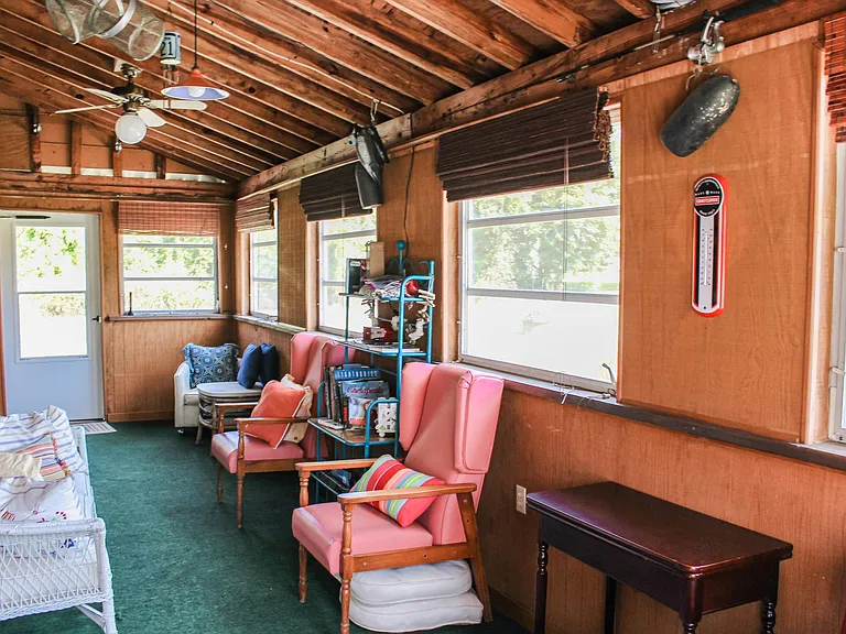 sunroom; between LR/FR and front deck