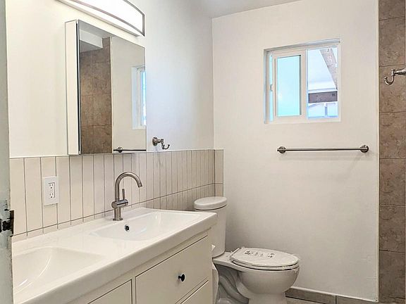 bathroom with double sinks.