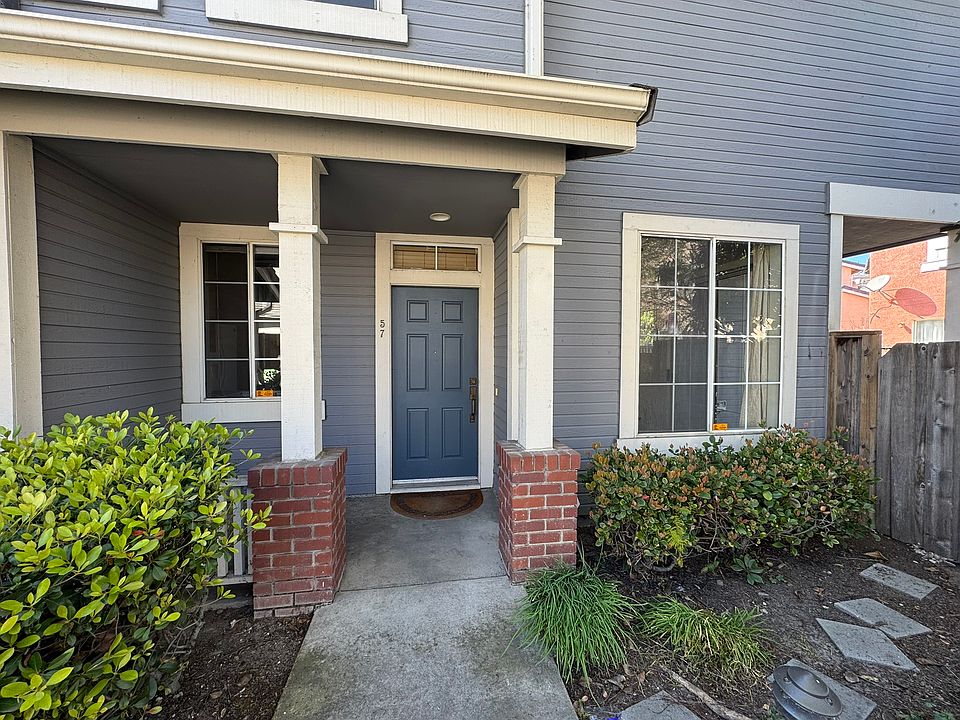 Quiet end unit townhouse. Front door with covered porch.