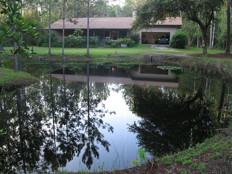 front view looking over pond