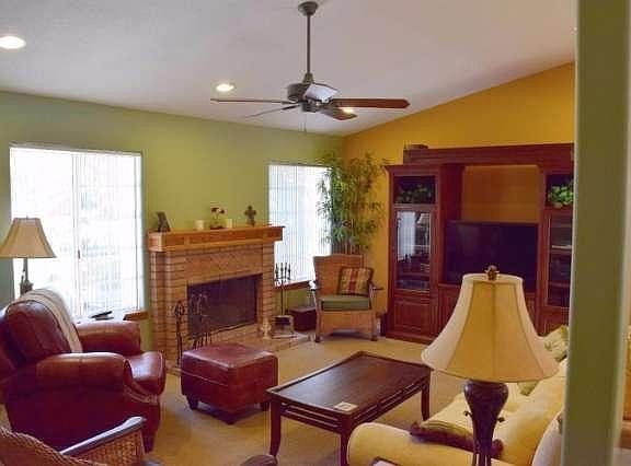 A fireplace is available for cool evenings and a ceiling fan