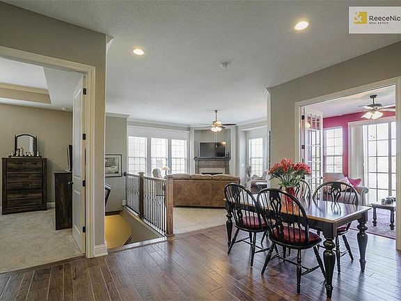 Dining area looking back at the living room, sun room and master bedroom.