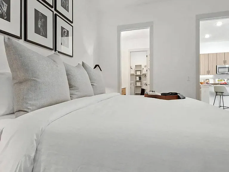 Bedroom with Direct Access to Walk-In Closet and Kitchen