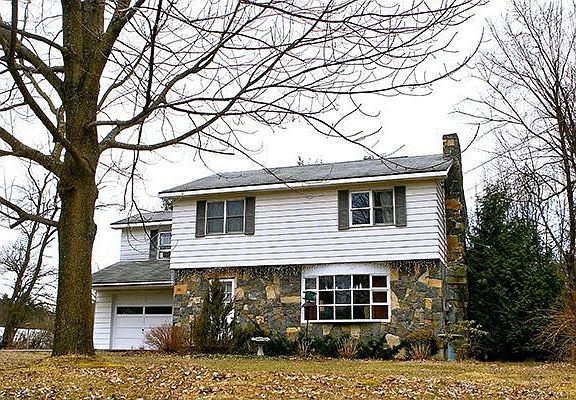 Stone front colonial.
