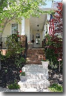 Walk up the steps to this great wrap around porch.