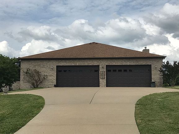   huge 4 car attached garage