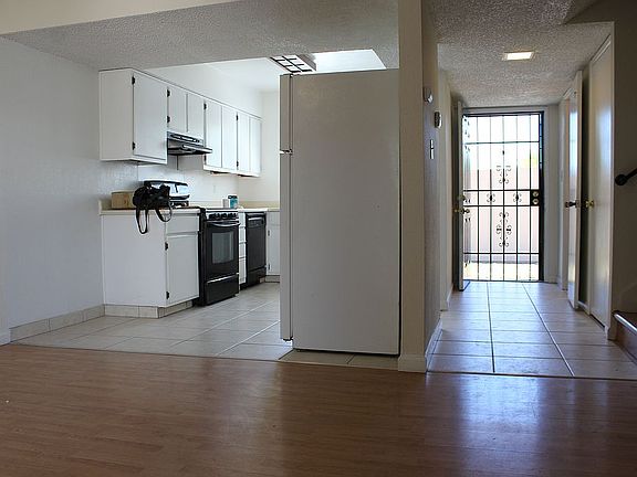 Front door and kitchen