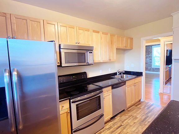 Side by Side Fridge with Ice, Glass Top Range, Built-in Micro, Dishwasher & Disposal