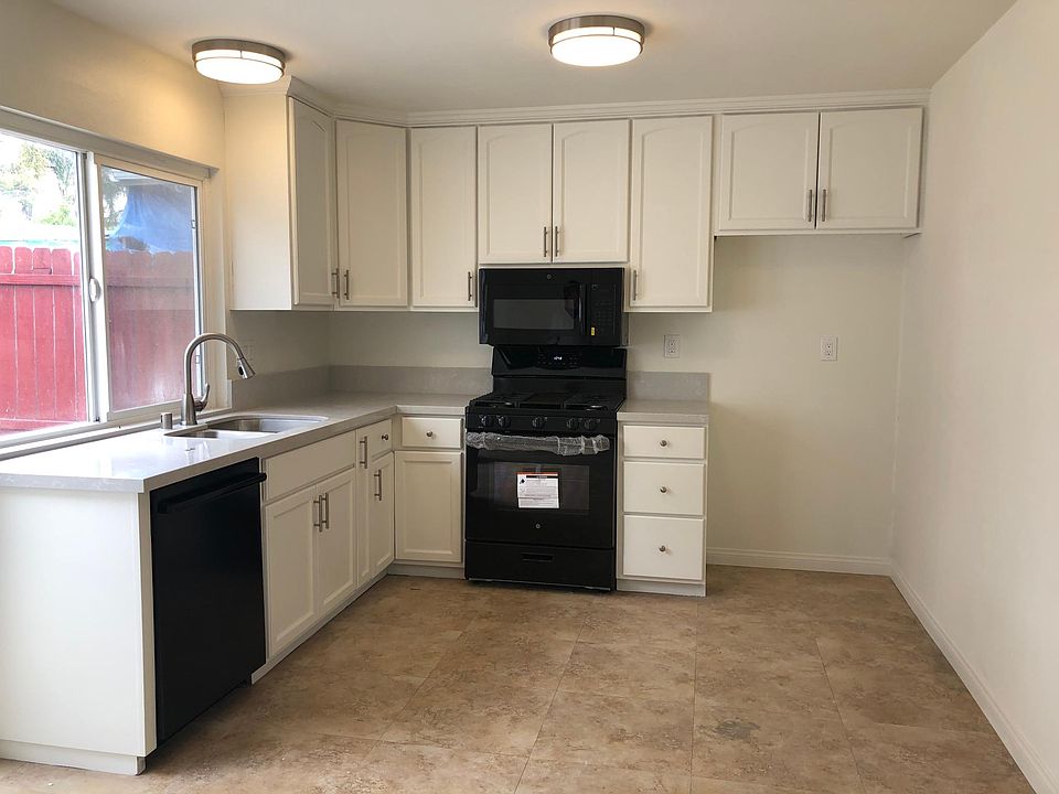 Kitchen with new appliances, counters, sink