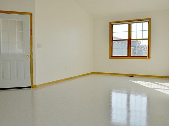 Living room space that flows into the kitchen