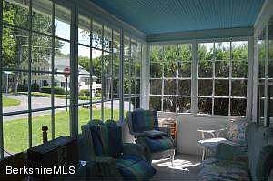large enclosed front porch