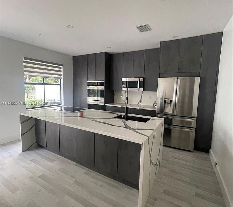 1st image of 10409 W 32nd Ln #10409