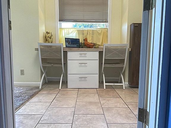 built in desk at entrance foyer