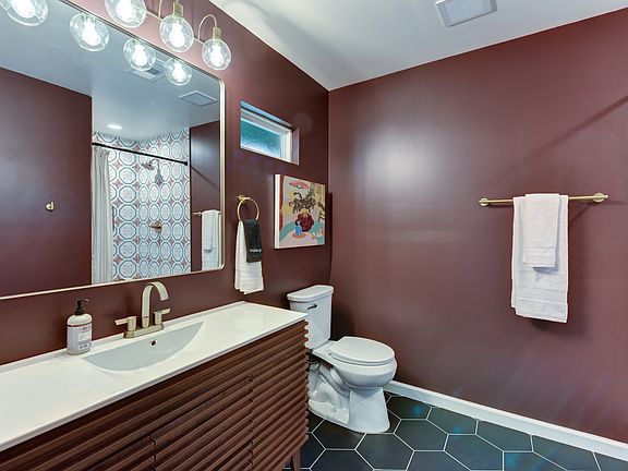 Remodeled full bathroom with walk-in shower
