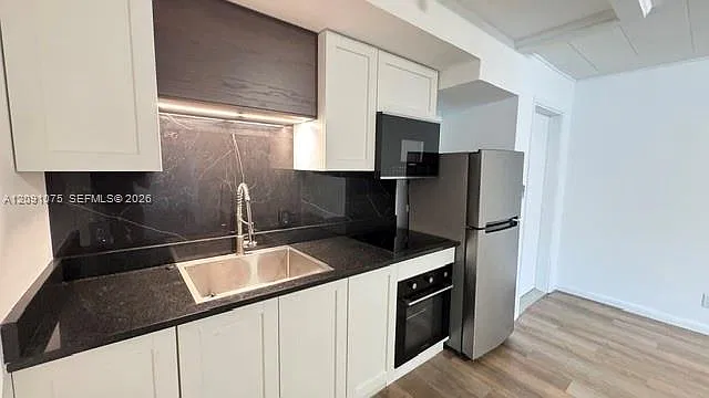 Beach Way Heights Unit — Photo 4