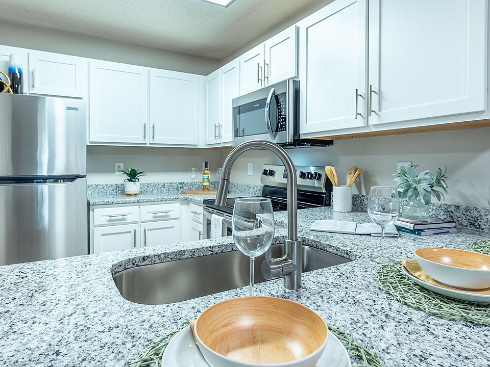 Kitchen with granite counters and stainless appliances