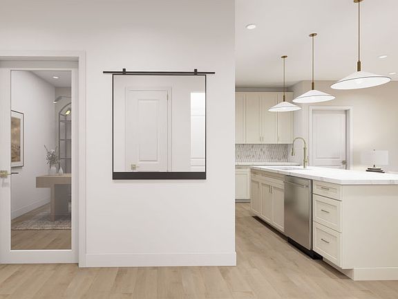 Foyer Looking into Den and Kitchen