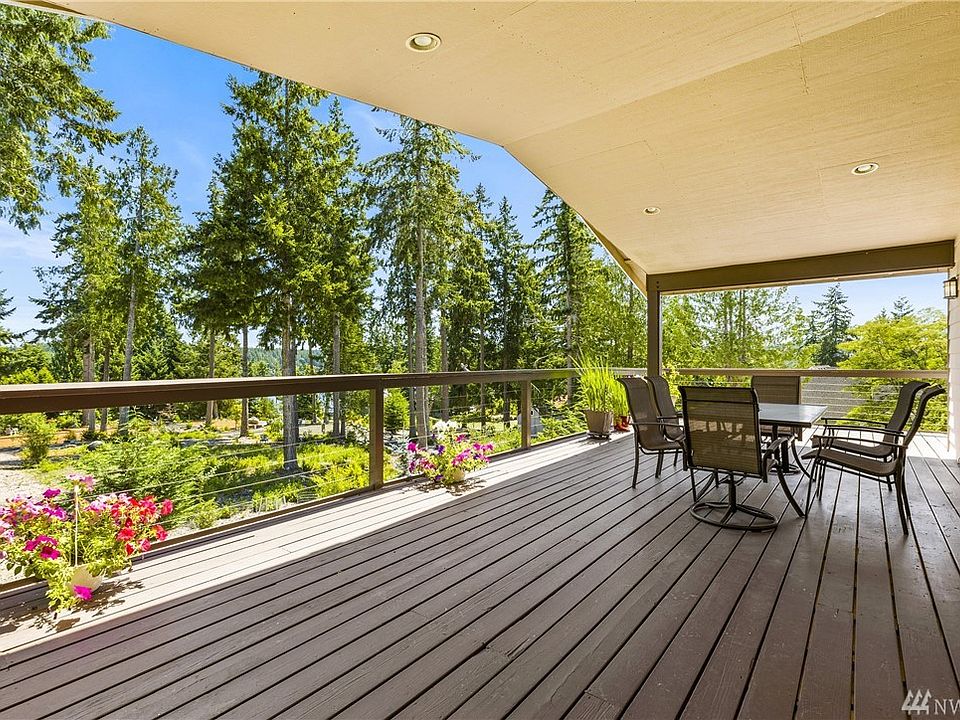 HUGE Covered Deck Allows for Effortless Entertaining & Year Round Rain or Shine Outdoor Enjoyment